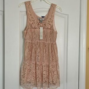 Sleeveless size large.Lacey peachy blush top